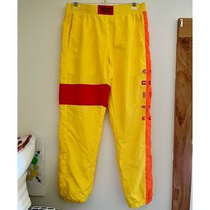 Petals by Petals and Peacocks Yellow Track Pants